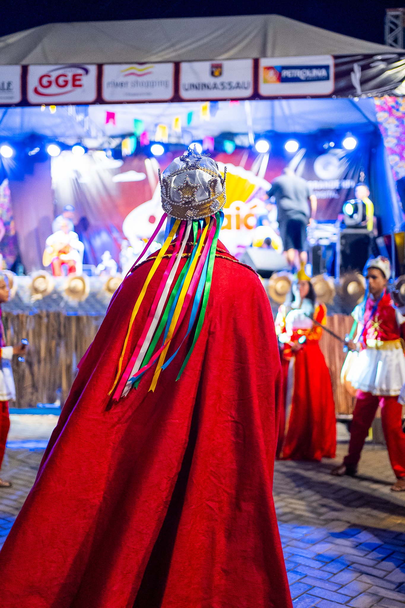 Leia mais sobre o artigo Reisado Pe Juan Francisco marcou presença em uma belíssima apresentação no tradicional Arraiá da Praça, que acontece na Praça da Sementeira.